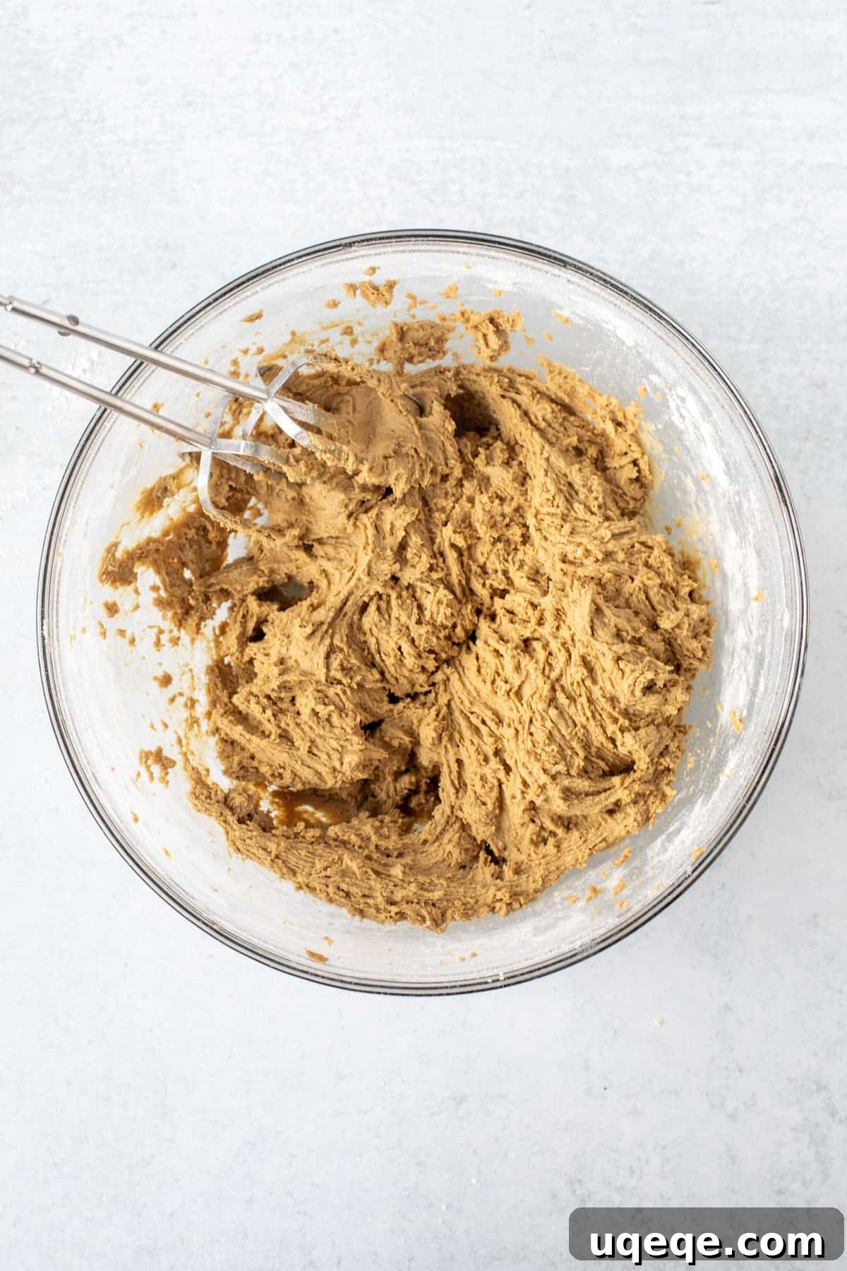 Gingerbread Cheesecake Delights 5 Bowl of rich, brown ginger molasses cookie dough, perfectly mixed and ready for chilling