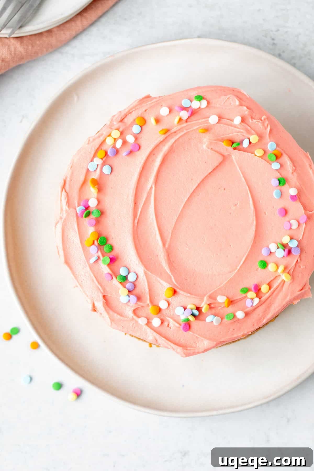 Petite Vanilla Dream 7 Small vanilla cake with pink frosting