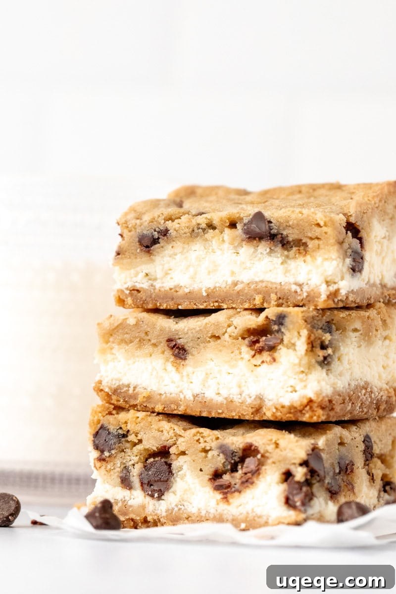 Heavenly Chocolate Chip Cheesecake Bars 2 Stack of three chocolate chip cheesecake bars showcasing their distinct layers