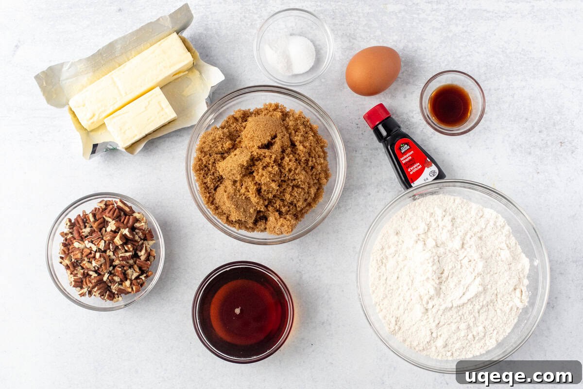Double Maple Delight Cookies 3 Arrangement of maple cookie ingredients including butter, brown sugar, maple syrup, flour, eggs, and nuts