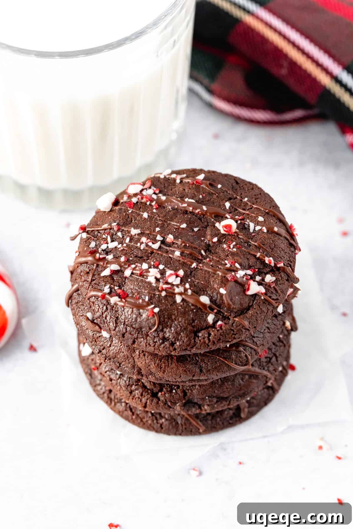 Chewy Double Chocolate Peppermint Delights 3 Stack of double chocolate peppermint cookies with glass of milk