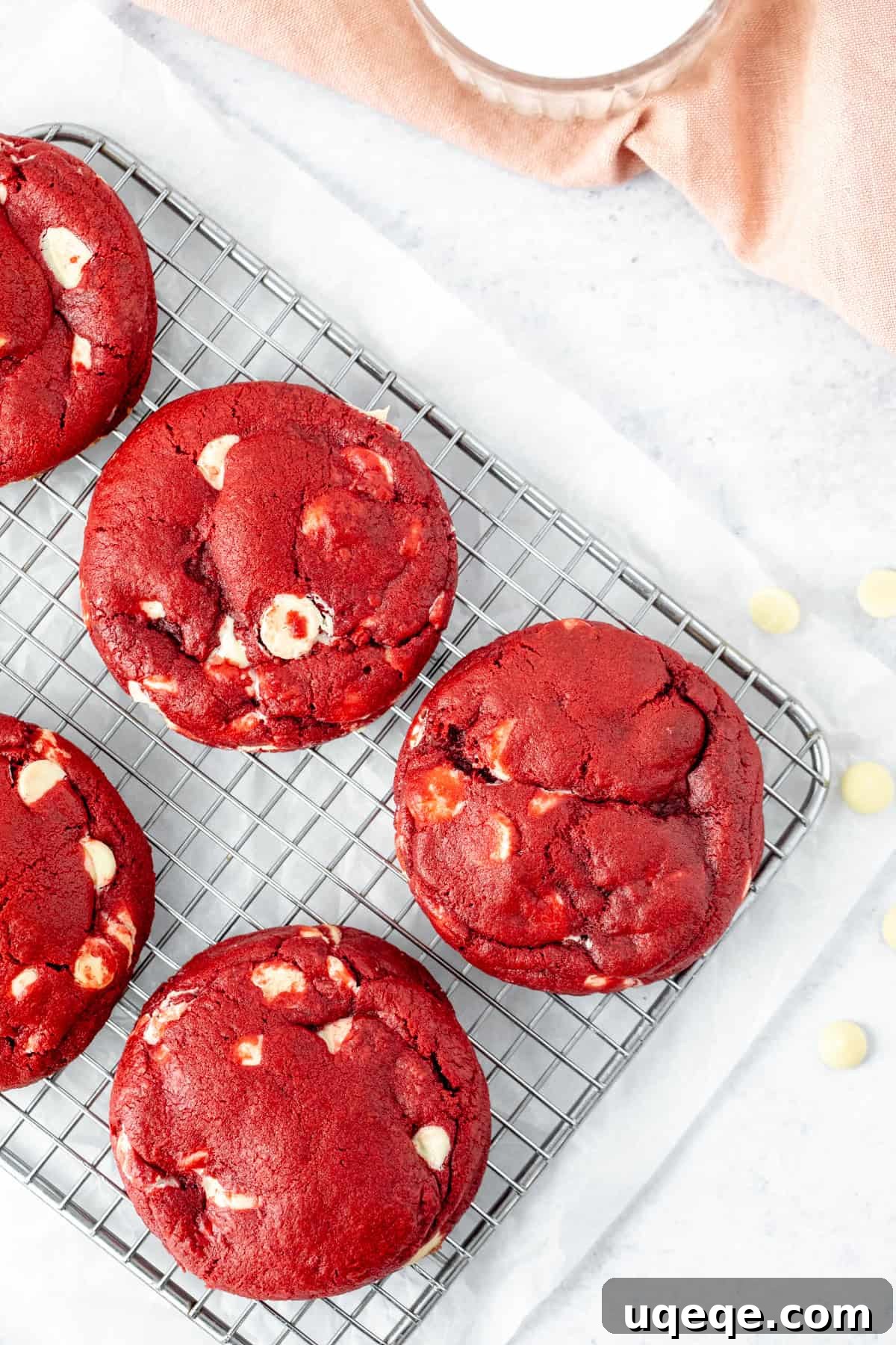 Plush Red Velvet Bakery Cookies 3 Freshly baked red velvet cookies cooling on a wire rack