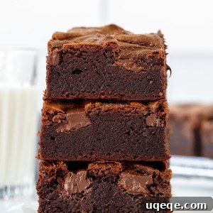 Stacked Nutella Swirl Brownies with a glass of milk