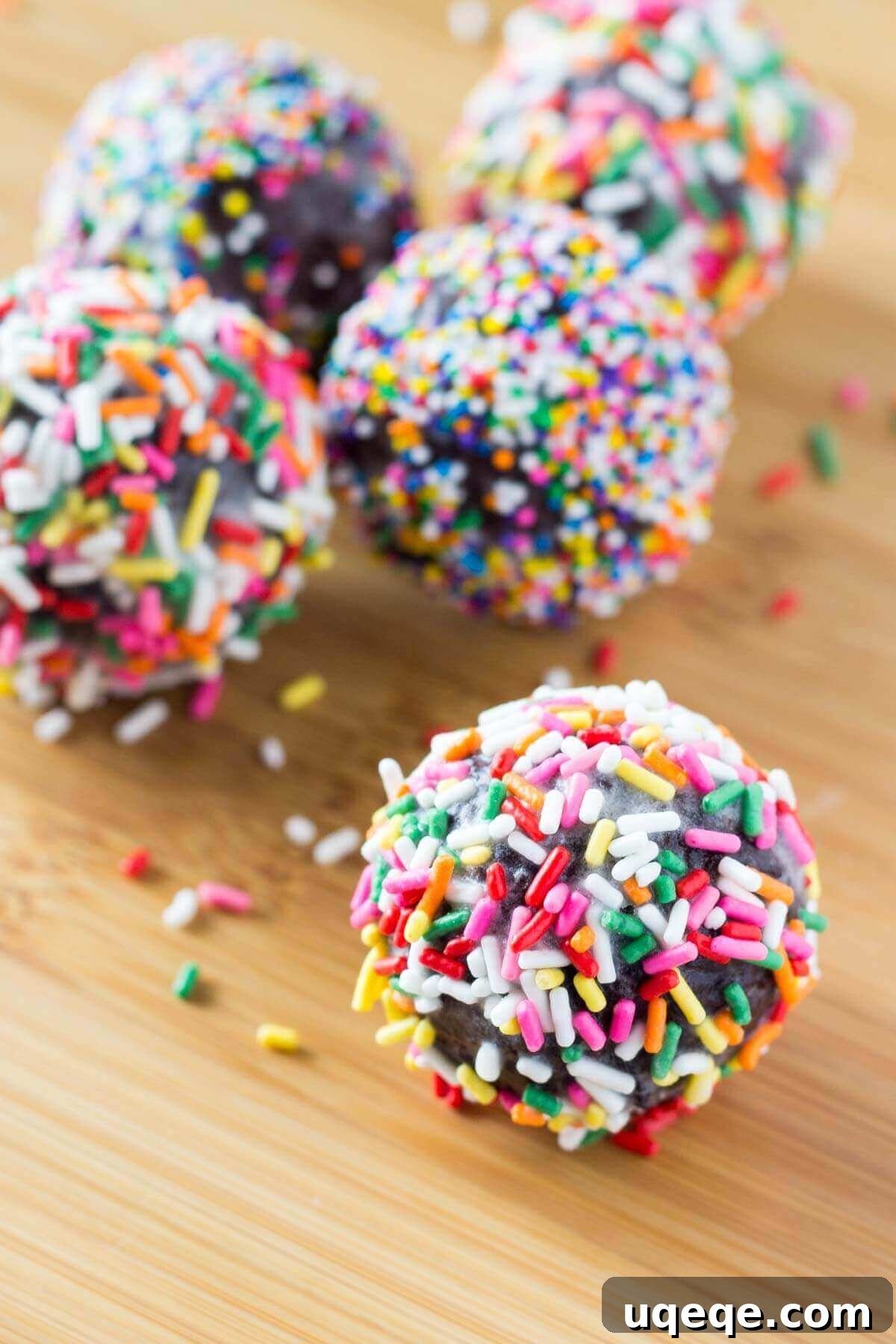 Decadent Chocolate Donut Poppers 2 Perfectly fudgy Chocolate Doughnut Holes dipped in sweet vanilla glaze! Fluffy, oh so moist & so much better than the doughnut shop!