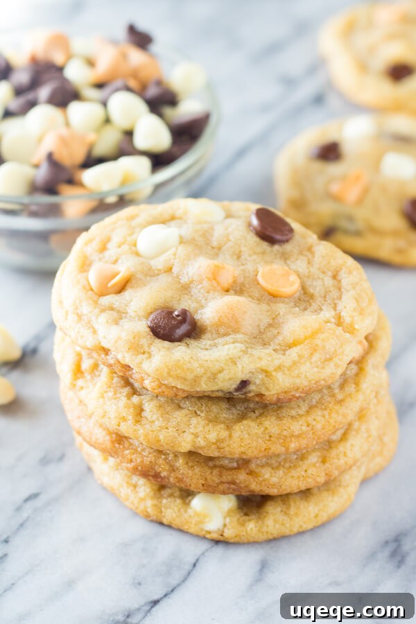 Irresistibly Thin and Chewy Chocolate Chip Cookies 4 A plate of freshly baked Thin Chewy Chocolate Chip Cookies, exhibiting their signature soft texture, caramel notes, and shiny chocolate chips. Perfect for stacking or enjoying individually.