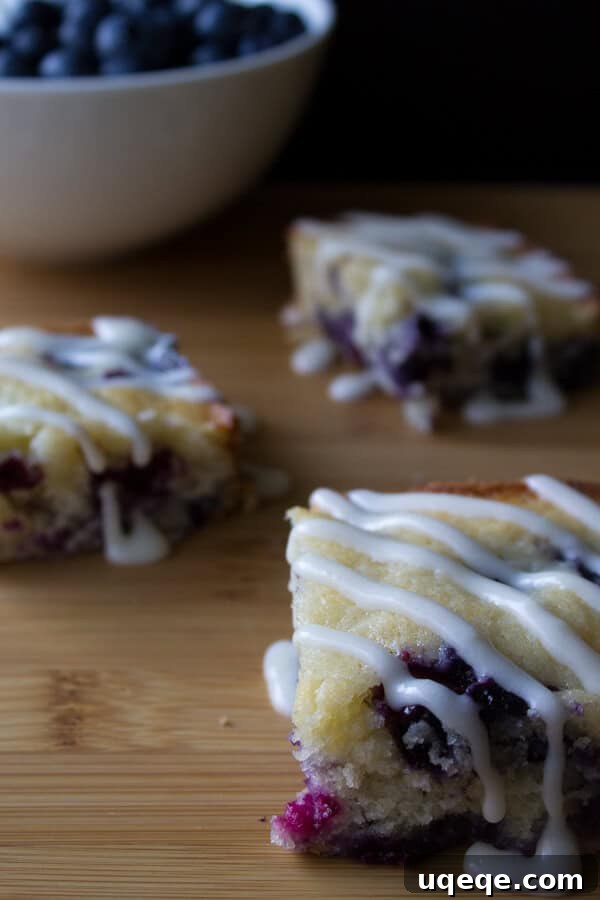 Buttermilk Blueberry Bliss 3 Blueberry Buttermilk Cake with Cream Cheese Glaze. Super moist & bursting with blueberries - this simple cake is perfect for summer!