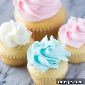 Mini Vanilla Cupcakes with vanilla buttercream, perfect for celebrations.