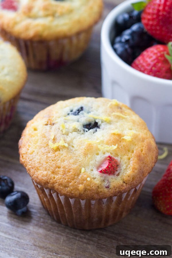 Summer Berry Burst Muffins 4 Triple Berry Muffins. Moist, fluffy, buttery & bursting with berries - make them with fresh or frozen fruit - they're always a hit! www.justsotasty.com