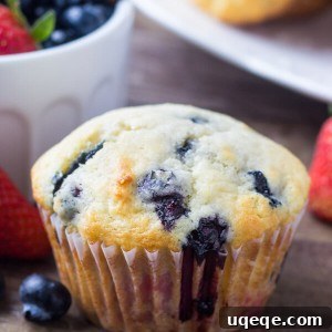 Triple Berry Muffins. Moist, fluffy, buttery & bursting with berries - make them with fresh or frozen fruit - they're always a hit! www.justsotasty.com