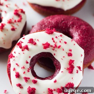 Crimson Velvet Baked Doughnuts 6 Baked Red Velvet Doughnuts. These moist doughnuts have the perfect cake doughnut crumb, a delicious red velvet flavor & a cream cheese glaze. www.justsotasty.com