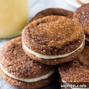 Ginger Molasses Sandwich Cookies with Eggnog Frosting