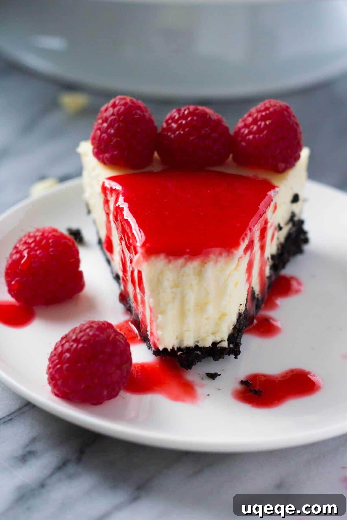 Recipes That Defined 2016 13 Smooth, creamy White Chocolate Cheesecake with an Oreo cookie crust and Raspberry Coulis Sauce. With easy step by step instructions - it's the PERFECT cheesecake every time!