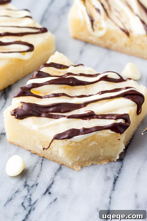 Velvet White Chocolate Squares 2 Super Fudgy, Gooey White Chocolate Brownies made in one bowl for white chocolate lovers.