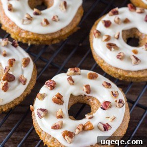 Spiced Carrot Cake Doughnuts 6 Carrot Cake Doughnuts. These baked doughnuts have all the flavor of your favorite carrot cake with cream cheese frosting in doughnut form. www.justsotasty.com