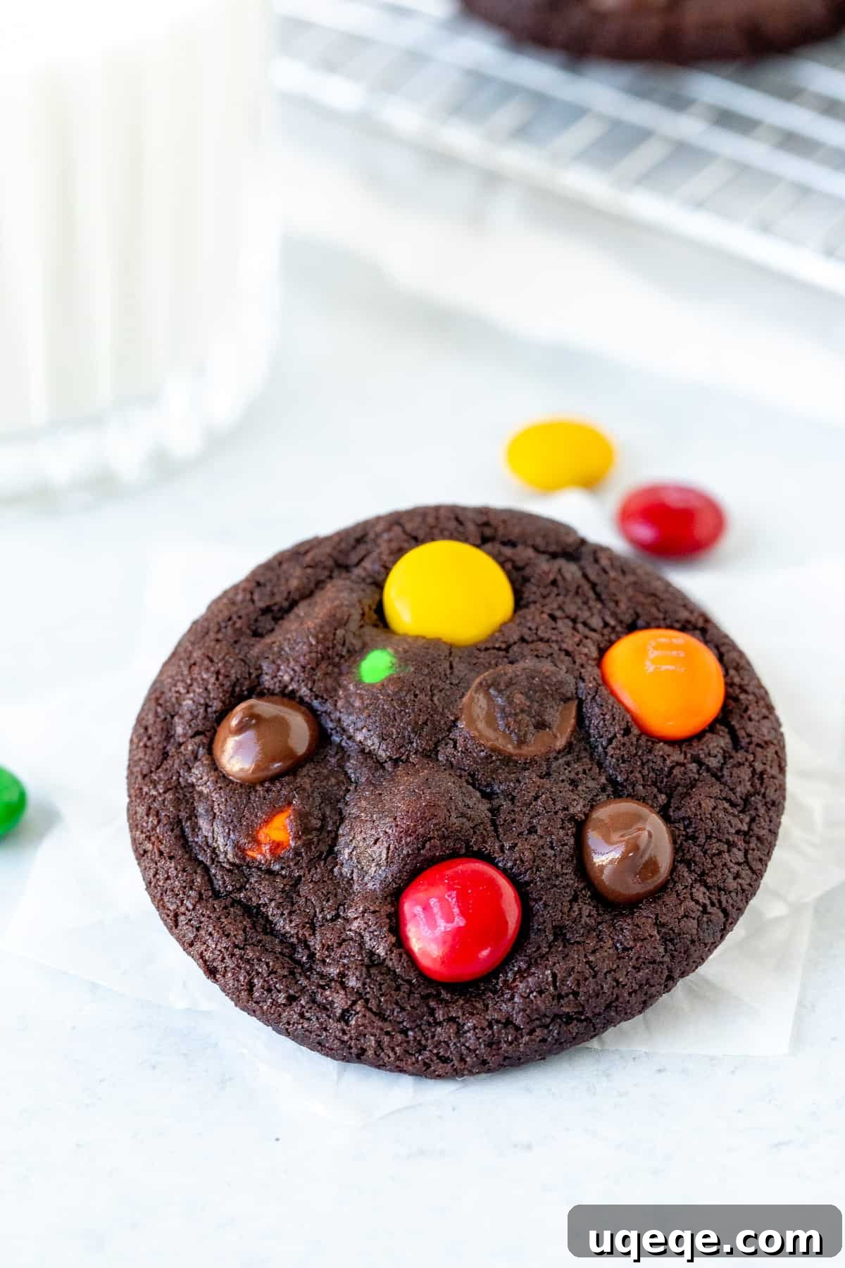 Rainbow Candy Chocolate Cookies 3 M&M chocolate cookie with glass of milk, emphasizing its perfect form