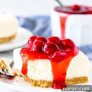 A slice of no-bake cherry cheesecake with a bite taken out, featured in the recipe card thumbnail.