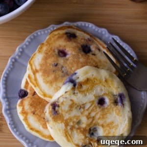 Light and fluffy Blueberry Buttermilk Pancakes.