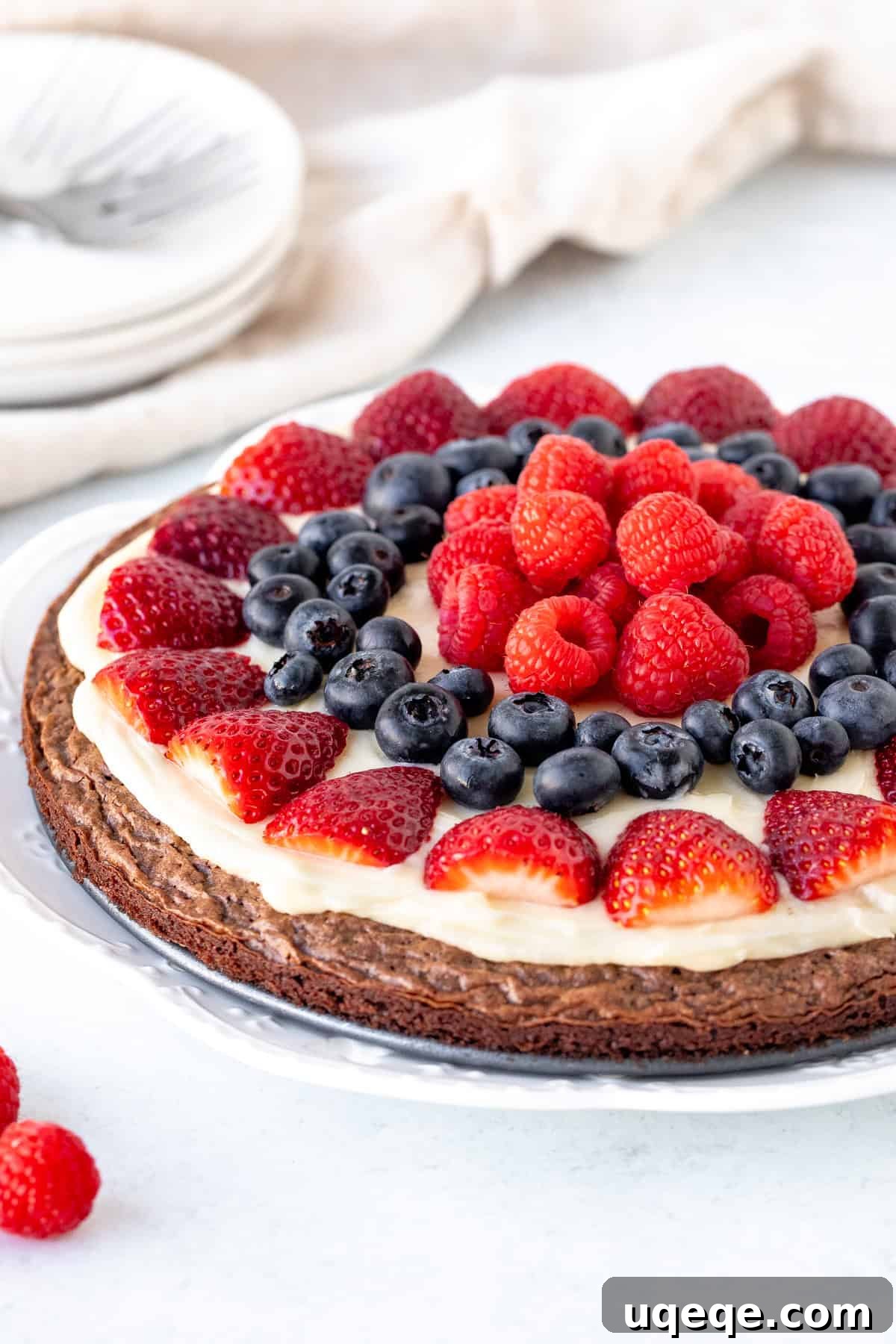 Fudge Brownie Fruit Pizza 2 Brownie fruit pizza with cream cheese topping and berries