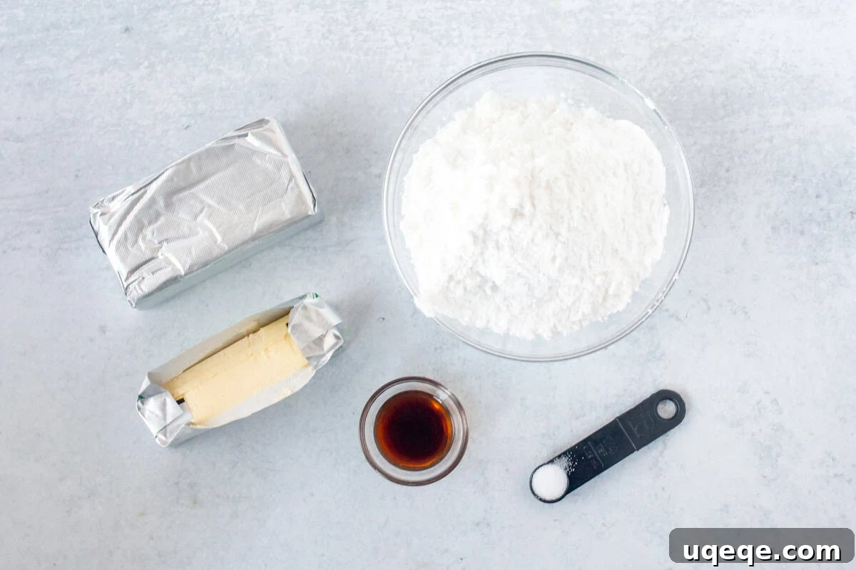 Orchard Spice Cake with Cream Cheese Cloud 6 The essential ingredients for a smooth and tangy cream cheese frosting are arranged, ready for mixing.