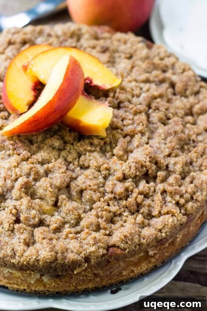 Sweet Peach Crumb Coffee Cake 2 This peach coffee cake is deliciously moist with the perfect sponge cake texture. Then there's a layer of juicy peaches and cinnamon brown sugar streusel topping.