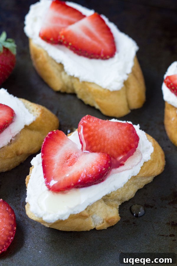 Tangy Chèvre Toasts 3 Serving homemade goat cheese crostini with fresh berries and honey at a relaxed girls' night, emphasizing easy entertaining and delicious food.