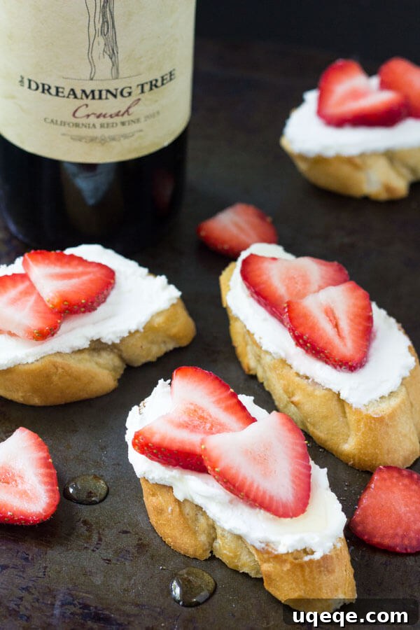 Tangy Chèvre Toasts 4 Step-by-step preparation of goat cheese crostini with fresh berries and honey, showcasing the whipped goat cheese and sliced baguette.