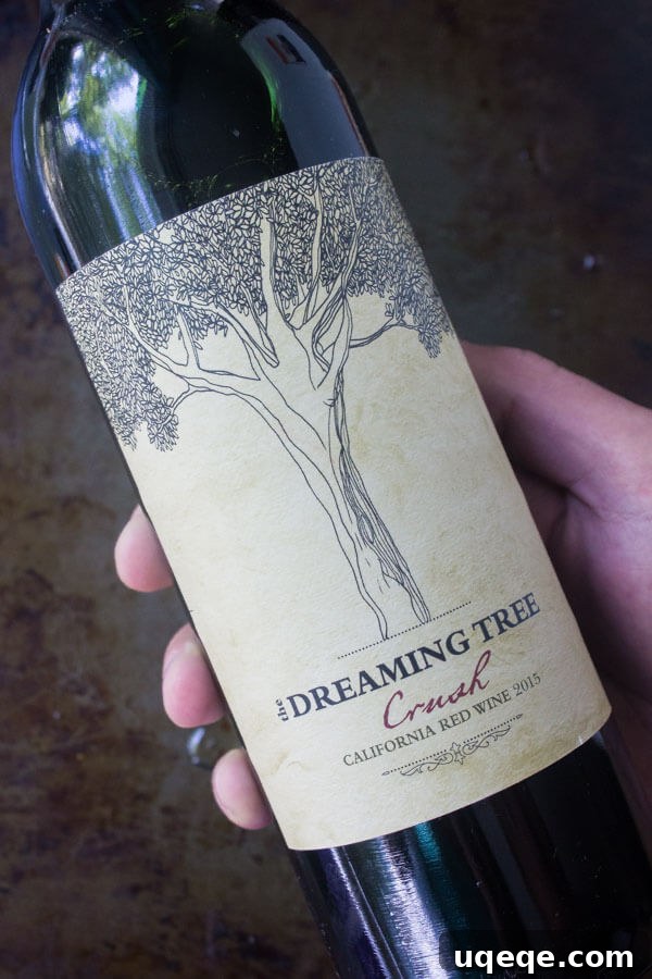 Tangy Chèvre Toasts 5 The Dreaming Tree Crush red wine bottle, a perfect pairing for goat cheese crostini and other appetizers at a social gathering.