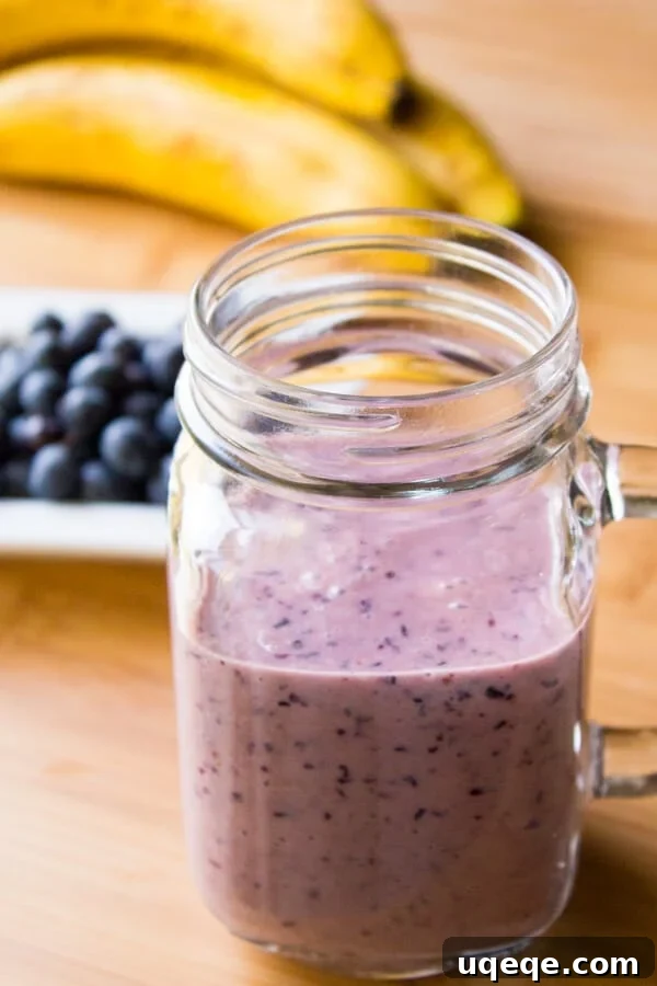 Blueberry Banana Bliss 2 Thick and creamy Blueberry Banana Smoothie in a glass, perfect for a healthy breakfast or snack. Learn how to make this delicious and antioxidant-rich beverage.