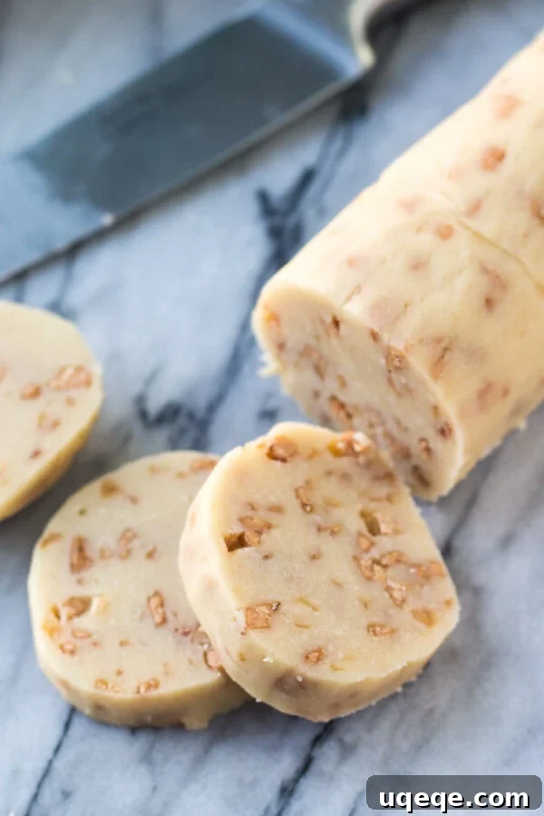 Golden Toffee Icebox Cookies 5 Soft, buttery, melt-in-your-mouth sugar cookies with golden edges. Filled with toffee pieces & dipped in chocolate - these toffee icebox cookies are just that incredible.
