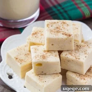 Luscious Eggnog Fudge 6 A plate of perfectly cut eggnog fudge pieces.