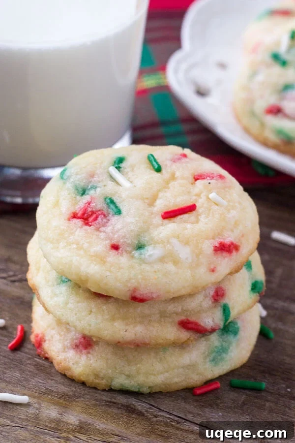 Joyful Confetti Cookies 4 Butter and sugar being creamed together in a mixer for Holiday Sprinkle Cookies, highlighting the importance of proper creaming for texture.