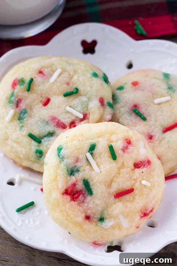 Joyful Confetti Cookies 5 Cookie dough with colorful jimmies sprinkles mixed in, showcasing the perfect consistency before baking for Holiday Sprinkle Cookies.