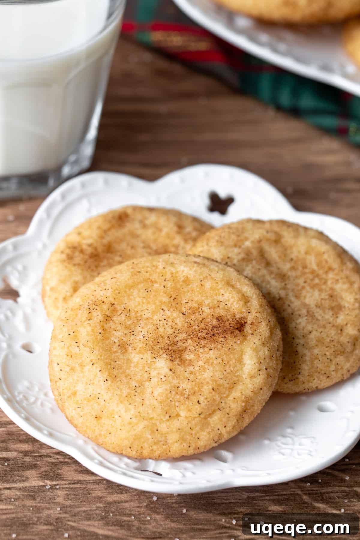 Perfectly Chewy Snickerdoodle Cookies 2 Small plate of three snickerdoodles with a glass of milk