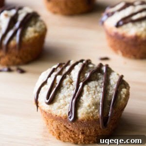 Peanut Butter Banana Muffins with Chocolate Glaze. Gluten free, sugar free & dairy free - you won't believe how easy and delicious this recipe is! www.justsotasty.com