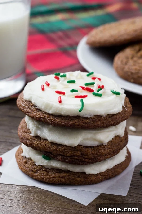 Close-up of baked soft gingerbread cookies before frosting, showcasing their perfect rounded shape and warm color.