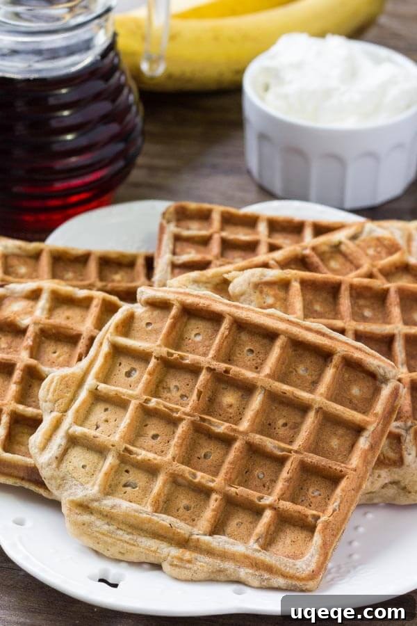 Banana Bread Bliss Waffles: Fluffy, Fragrant, and Cinnamony 3 A plate featuring freshly cooked banana bread waffles, perfectly golden brown and ready to be served for breakfast or brunch.