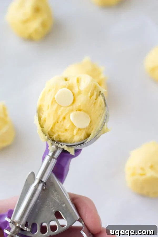Zingy Lemon Cake Mix Cookies 4 Cookie dough for lemon cake mix cookies with white chocolate chips