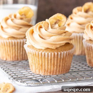 Peanut Butter Banana Dream Cupcakes 5 Banana peanut butter cupcakes on a cooling rack
