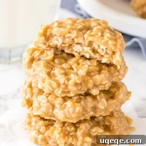 A vibrant stack of five chewy peanut butter no-bake oatmeal cookies, highlighting their simple, homemade appeal and inviting texture.