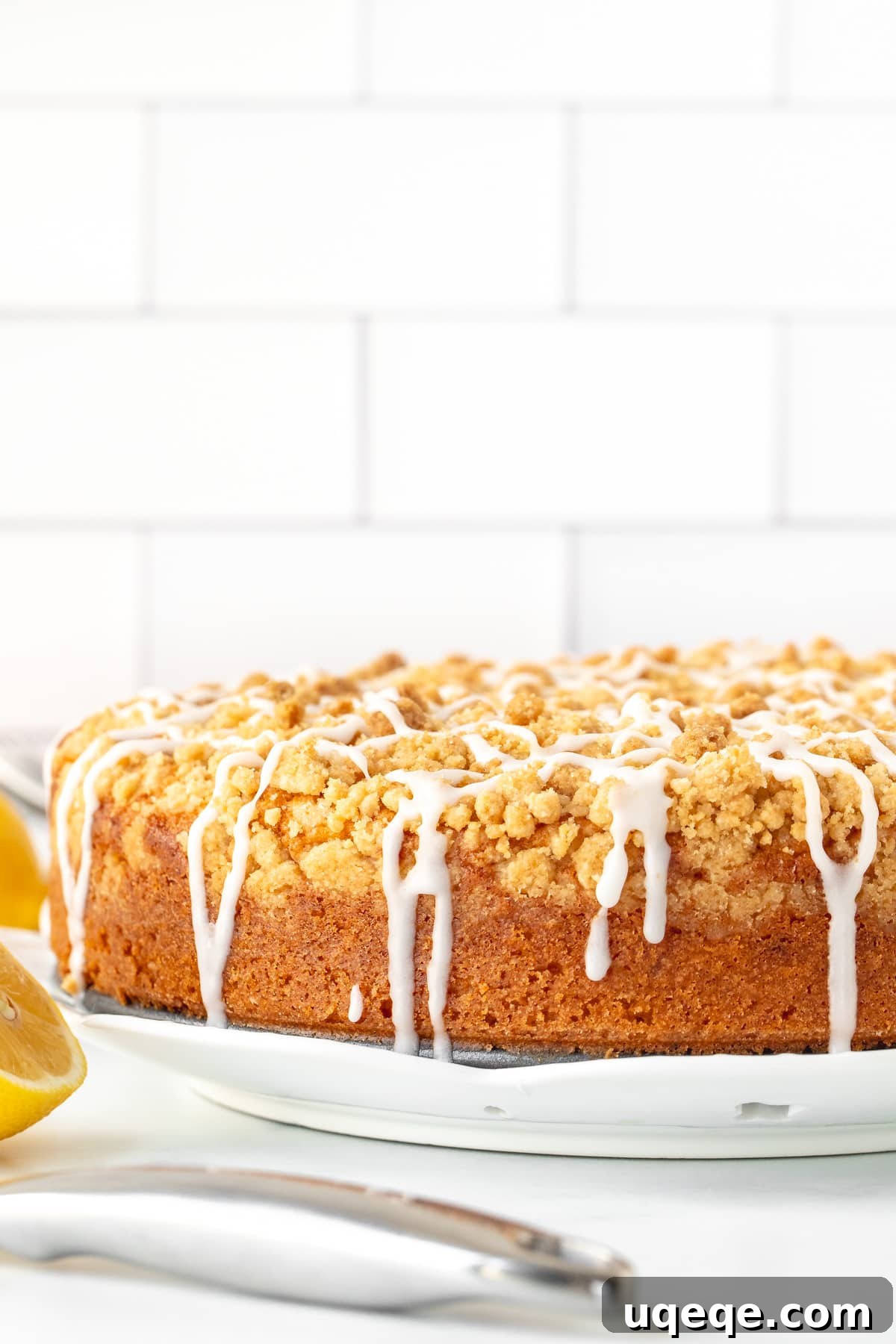 Zesty Lemon Coffee Cake 3 9-inch round lemon coffee cake with streusel topping drizzled with glaze
