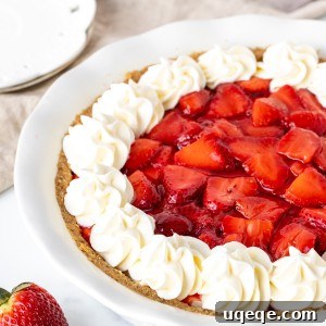 Strawberry cream cheese pie, with whipped cream around the edges