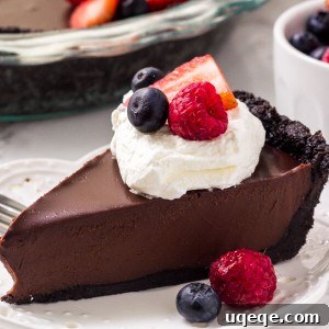 This no bake chocolate pie is rich, fudgy, and seriously delicious. The crust is no bake and made with Oreo cookies. Then the filling is a chocolate ganache that's silky smooth