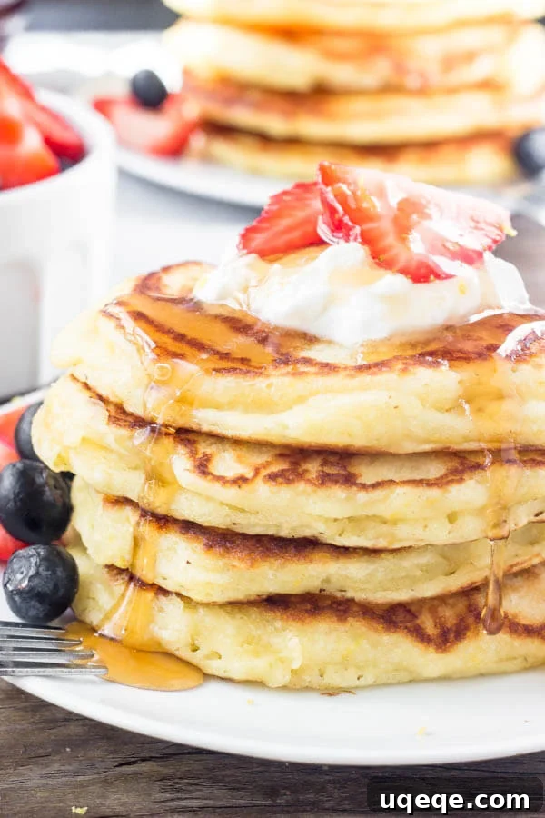 These lemon pancakes have a deliciously bright & sunny flavor thanks to fresh lemon juice and lemon zest. They're extra fluffy with golden edges, and taste delicious with summer berries or syru