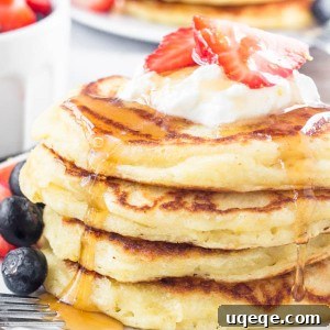 These lemon pancakes have a deliciously bright & sunny flavor thanks to fresh lemon juice and lemon zest. They're extra fluffy with golden edges, and taste delicious with summer berries or syru