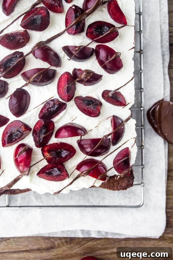 Black forest brownies are extra fudgy with sweetened whipped cream and fresh cherries. 