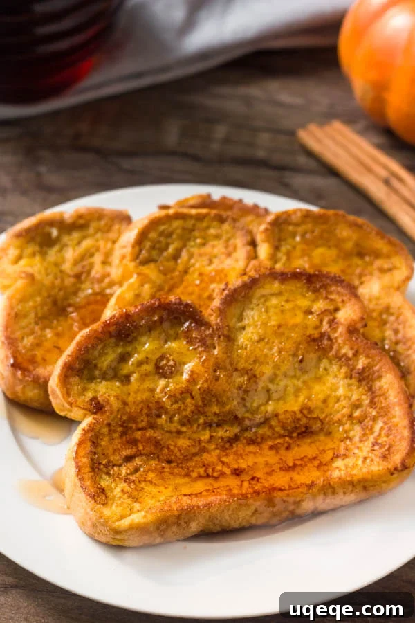 Golden Pumpkin Spice French Toast 3 A plate of perfect pumpkin french toast. Extra fluffy with golden edges.