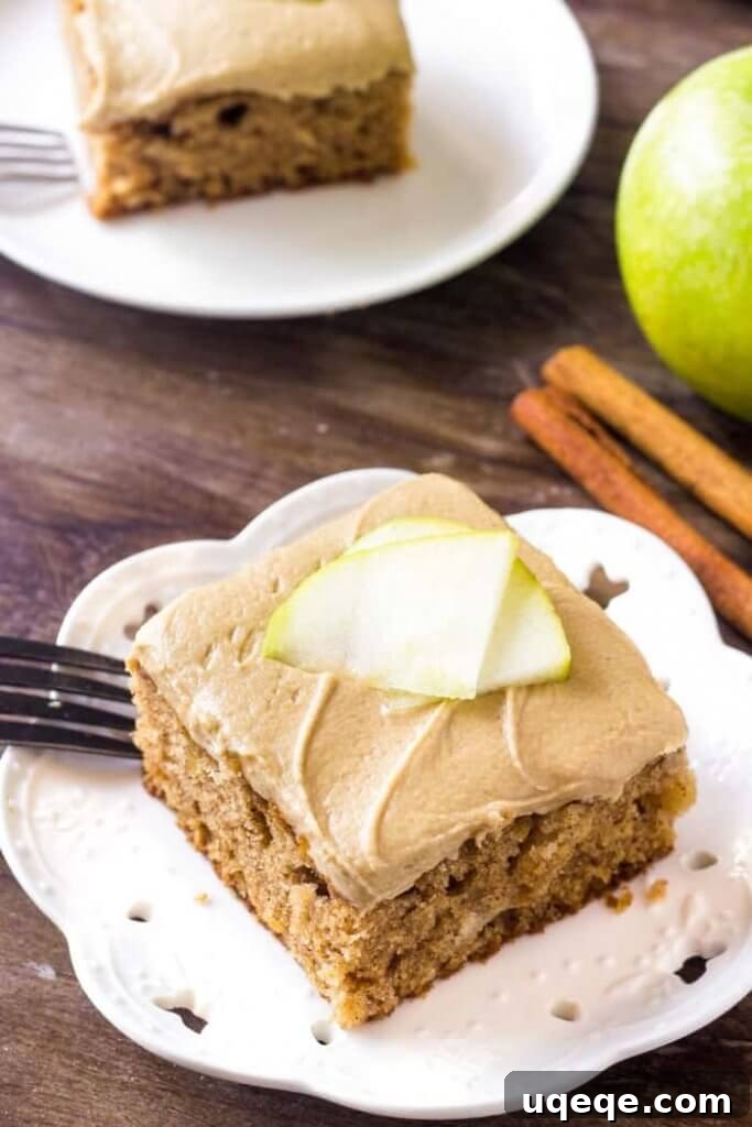 Golden Caramel Apple Temptation 2 Apple cake with caramel frosting is moist, filled with cinnamon & perfect for fall.