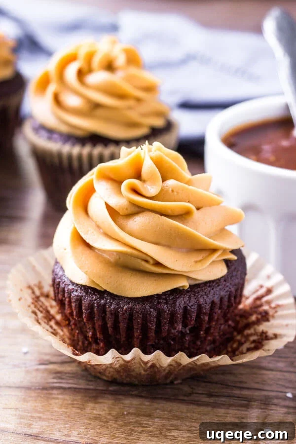 Decadent Chocolate Caramel Cupcakes 3 A close-up of a chocolate caramel cupcake showcasing its rich frosting and caramel drizzle.
