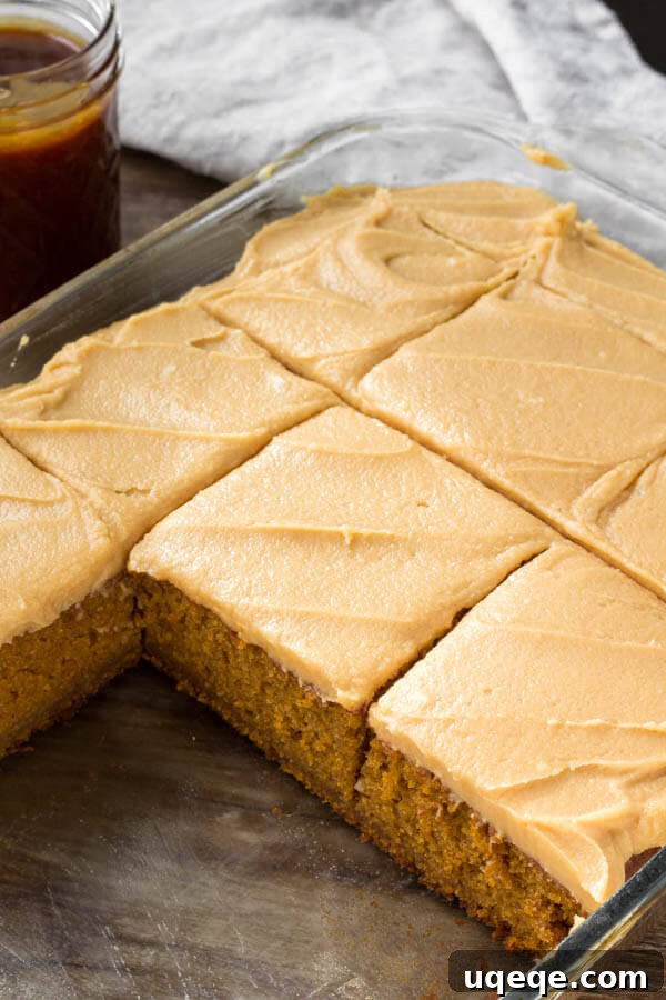 Decadent Pumpkin Caramel Cream Cheese Cake 3 A pan of flavorful pumpkin cake with caramel cream cheese frosting.