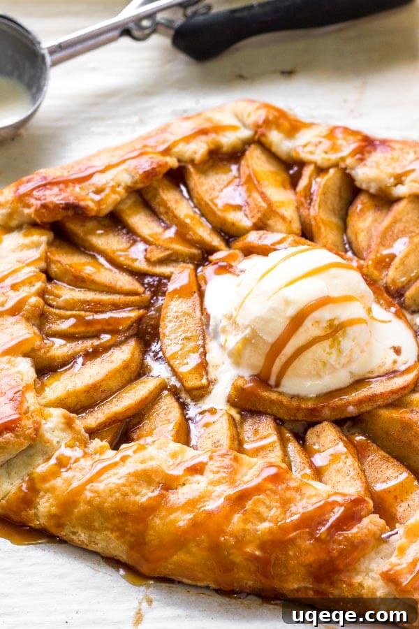 Rustic Caramel Apple Tart 5 A perfectly baked easy apple galette with flaky golden pastry and glistening salted caramel sauce, ready to be served.
